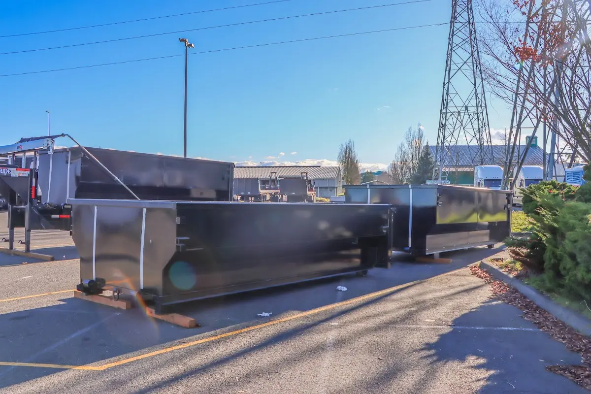 Roll-off dumpster ready for waste disposal at job site for 3 Yard Dumpster Rental in Edinburg